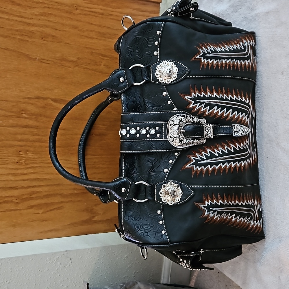 Black leather tote with western accents